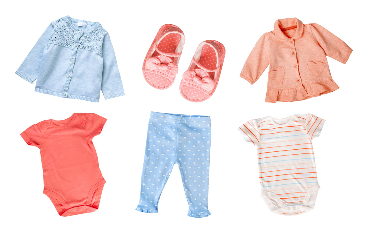 Pastel colors cotton baby child girl clothes set collage isolated.